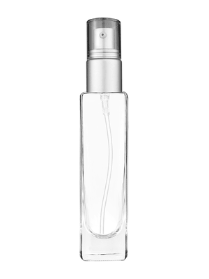 Slim design 50 ml, 1.7oz  clear glass bottle  with with a matte silver collar treatment pump and clear overcap.