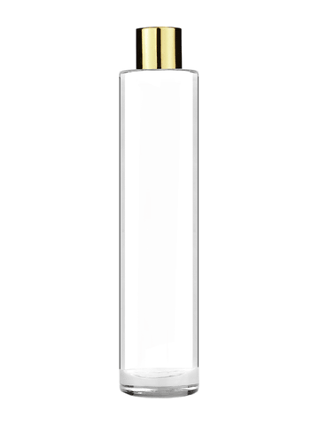 Cylinder design 100 ml, 3 1/2oz  clear glass bottle  with reducer and shiny gold cap.