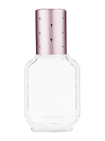 Footed rectangular design 10ml, 1/3oz Clear glass bottle with metal roller ball plug and pink cap with dots.
