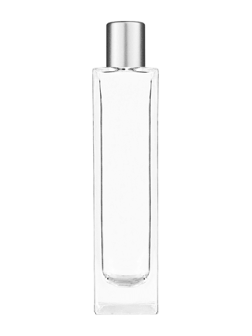 Sleek design 100 ml, 3 1/2oz  clear glass bottle  with reducer and tall silver matte cap.