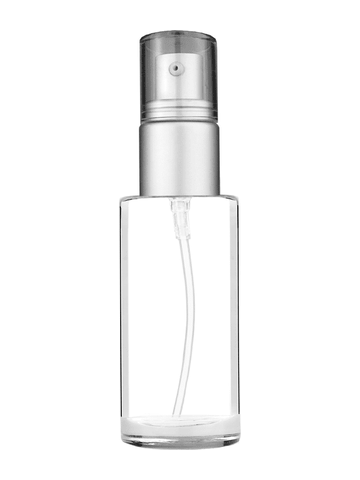 Cylinder design 30 ml 1oz  clear glass bottle  with with a matte silver collar treatment pump and clear overcap.