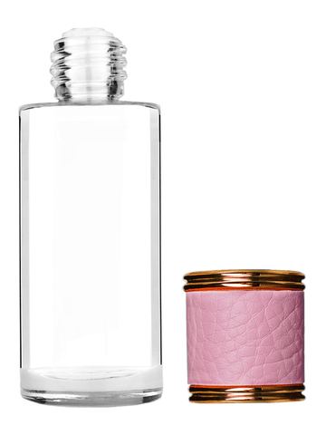 Cylinder design 25 ml 1oz  clear glass bottle  with reducer and pink faux leather cap.