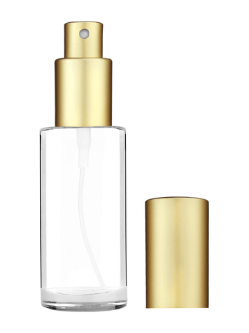 Cylinder design 25 ml 1oz  clear glass bottle  with matte gold spray pump.