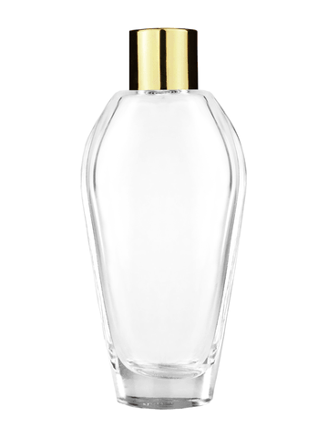 Grace design 55 ml, 1.85oz  clear glass bottle  with reducer and shiny gold cap.