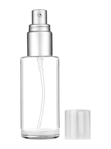 Cylinder design 30 ml 1oz  clear glass bottle  with with a matte silver collar treatment pump and clear overcap.