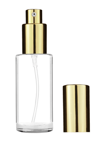 Cylinder design 30 ml 1oz  clear glass bottle  with shiny gold lotion pump.