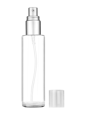 Cylinder design 50 ml, 1.7oz  clear glass bottle  with with a matte silver collar treatment pump and clear overcap.