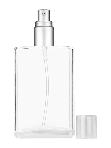 Elegant design 100 ml, 3 1/2oz  clear glass bottle  with with a matte silver collar treatment pump and clear overcap.