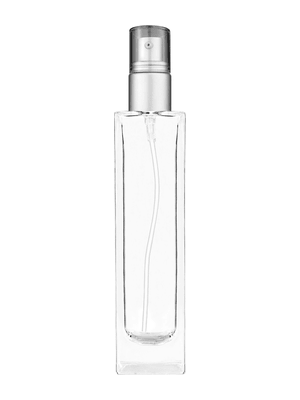 Sleek design 100 ml, 3 1/2oz  clear glass bottle  with with a matte silver collar treatment pump and clear overcap.