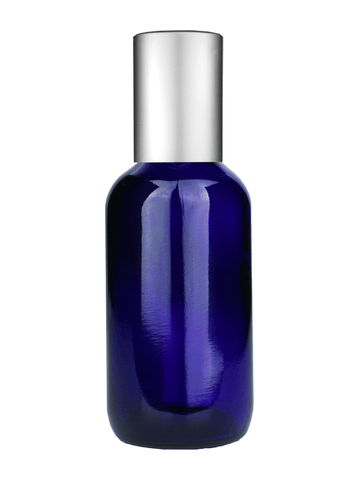 Boston round design 60ml, 2oz Cobalt blue glass bottle with metal roller ball plug and matte silver cap.
