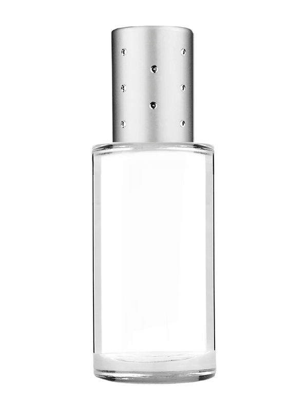 Pillar design 9ml Clear glass bottle with metal roller ball plug and silver cap with dots.