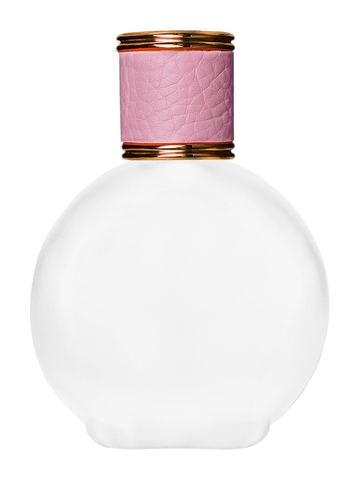 Round design 128 ml, 4.33oz frosted glass bottle with reducer and pink faux leather cap.