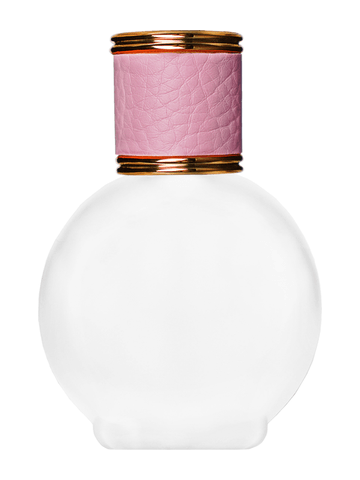 Round design 78 ml, 2.65oz frosted glass bottle with reducer and pink faux leather cap.