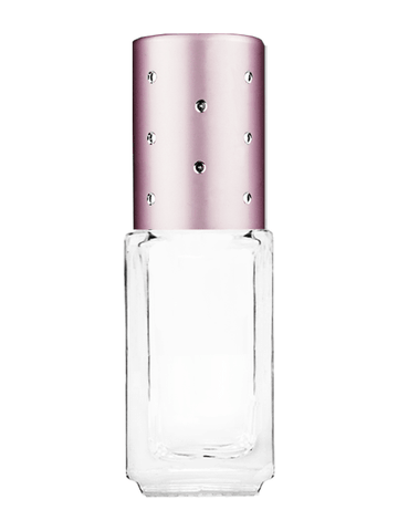 Sleek design 5ml, 1/6oz Clear glass bottle with plastic roller ball plug and pink cap with dots.