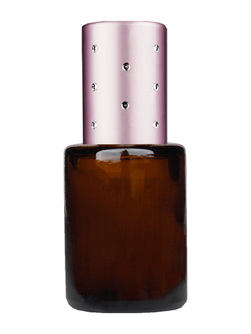 Tulip design 5ml, 1/6 oz Amber glass bottle with metal roller ball plug and pink cap with dots.