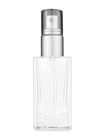 Empire design 50 ml, 1.7oz  clear glass bottle  with with a matte silver collar treatment pump and clear overcap.