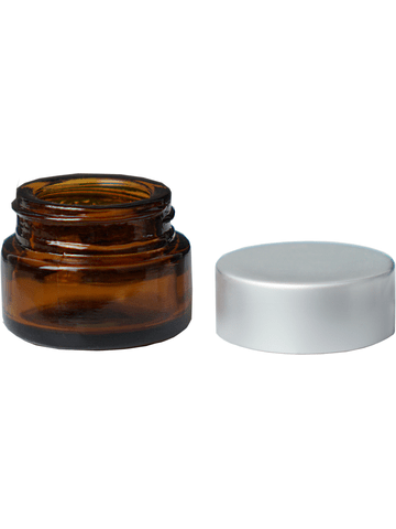 Cream glass jar style 5 ml amber bottle with silver cap .