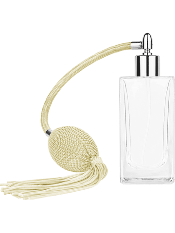 Empire design 100 ml, 3 1/2oz  clear glass bottle  with Ivory vintage style bulb sprayer with tassel with shiny silver collar cap.