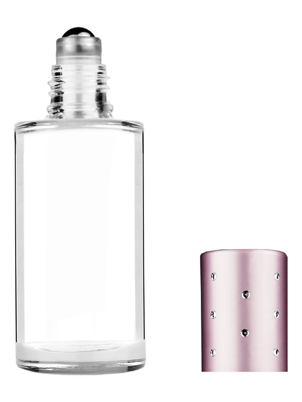 Pillar design 9ml Clear glass bottle with metal roller ball plug and pink cap with dots.