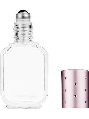 Footed rectangular design 10ml, 1/3oz Clear glass bottle with metal roller ball plug and pink cap with dots.