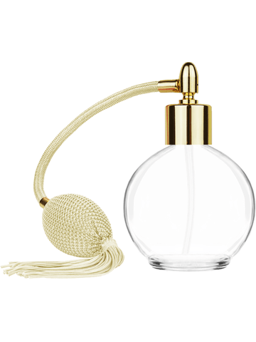 Round design 78 ml, 2.65oz  clear glass bottle  with Ivory vintage style bulb sprayer with tassel and shiny gold collar cap.