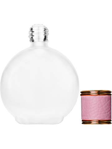 Round design 128 ml, 4.33oz frosted glass bottle with reducer and pink faux leather cap.