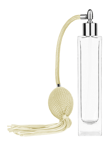 Sleek design 100 ml, 3 1/2oz  clear glass bottle  with Ivory vintage style bulb sprayer with tassel and shiny silver collar cap.