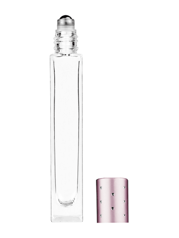 Tall rectangular design 10ml, 1/3oz Clear glass bottle with metal roller ball plug and pink cap with dots.