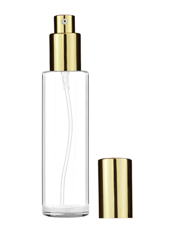 Cylinder design 50 ml, 1.7oz  clear glass bottle  with shiny gold lotion pump.