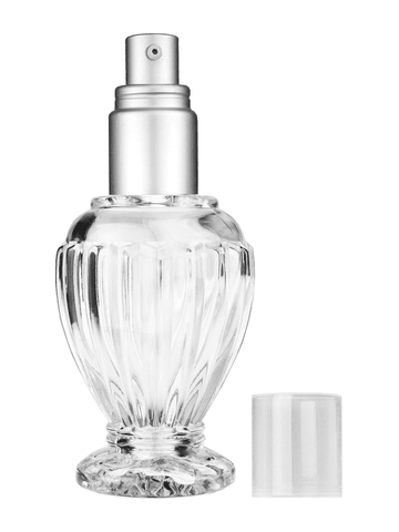 Diva design 46 ml, 1.64oz  clear glass bottle  with with a matte silver collar treatment pump and clear overcap.