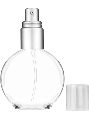 Round design 78 ml, 2.65oz  clear glass bottle  with with a matte silver collar treatment pump and clear overcap.