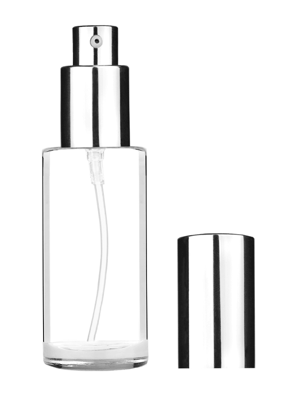 Cylinder design 25 ml clear glass bottle  with shiny silver lotion pump.